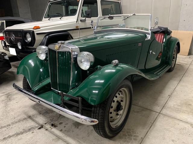 MG