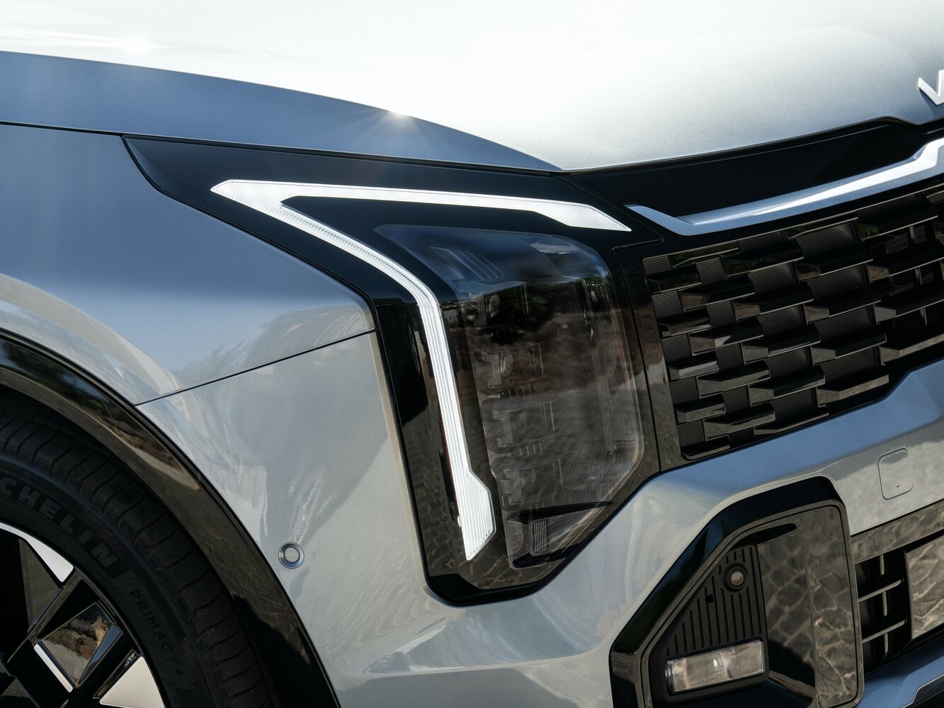 Kia Sportage — справочные фотографии комплектации, Передняя фара