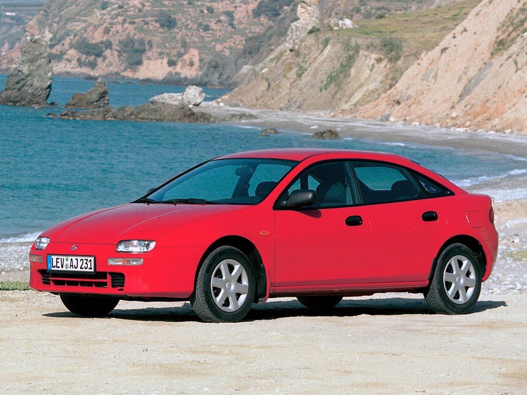 Mazda Lantis — Поколение 1993–1997 (1993–1997)
