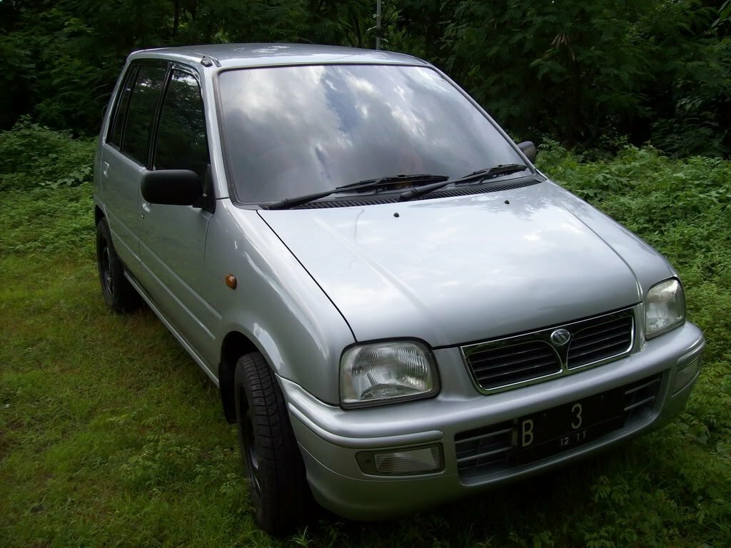 Daihatsu Ceria (2001–2006) · 0.9 AT (50 л.с.)