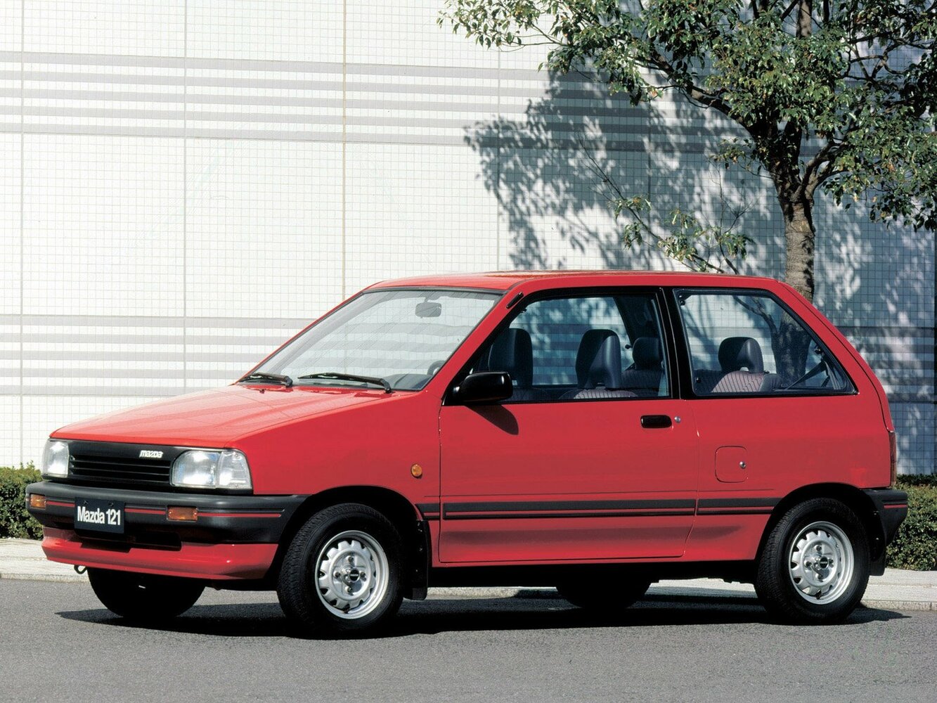 Mazda 121 I (1987–1991) · 1.1 MT (57 л.с.)