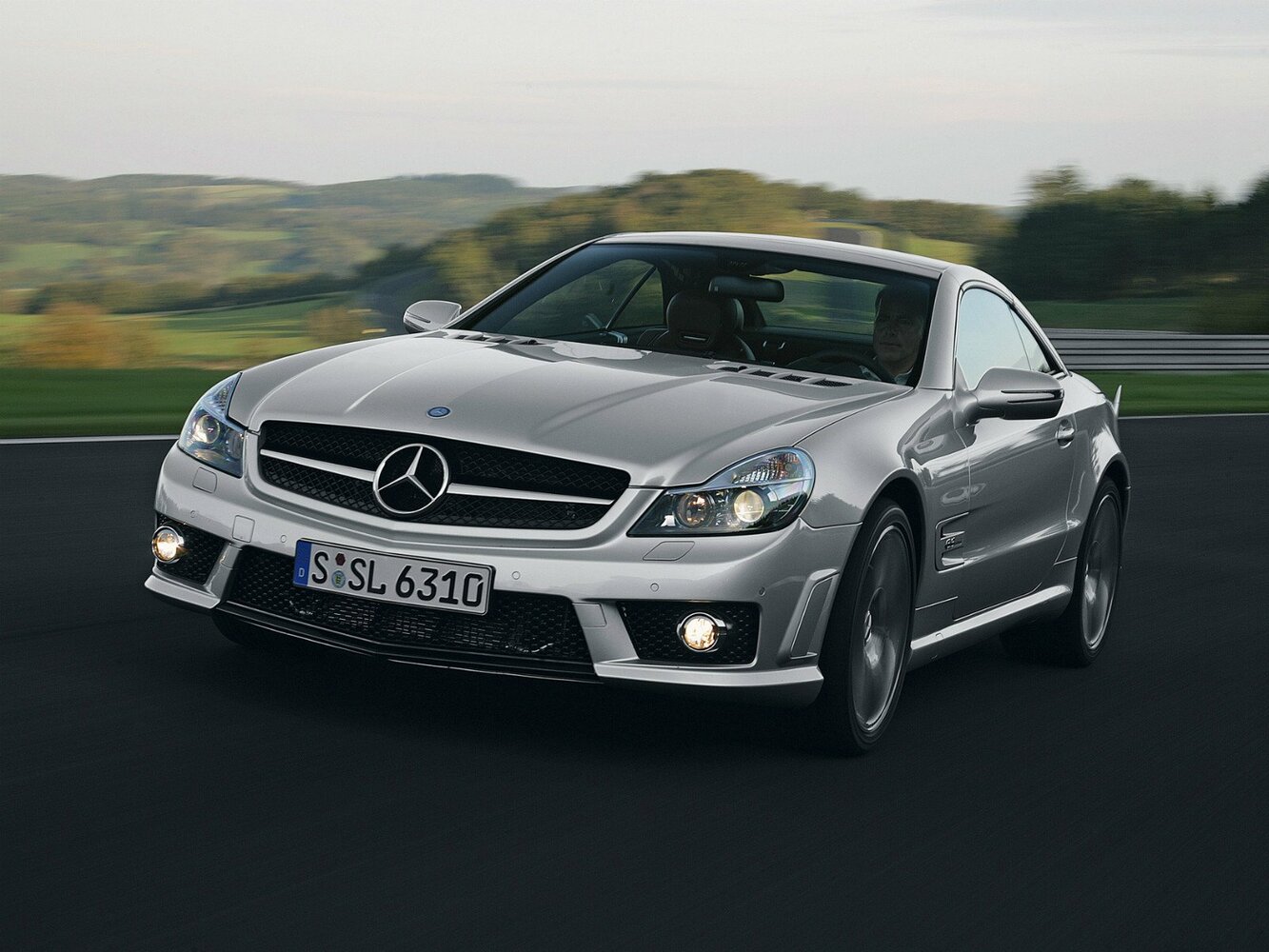 Mercedes-Benz SL-Класс AMG II (R230) Рестайлинг 2 (2008–2011) · 65 AMG Black Series 6.0 AT (670 л.с.)