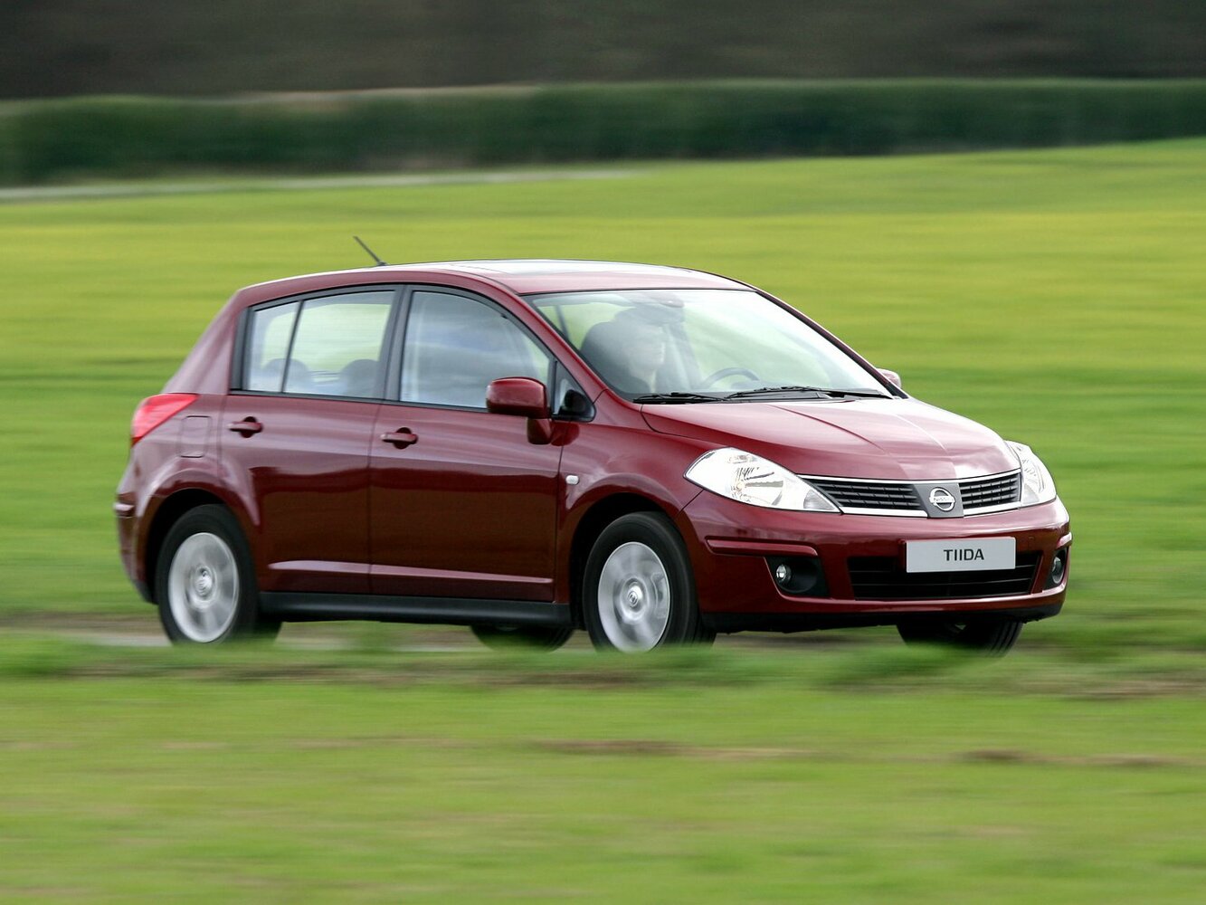 Nissan Tiida I Рестайлинг (2010–2013) · 1.8 MT (126 л.с.)