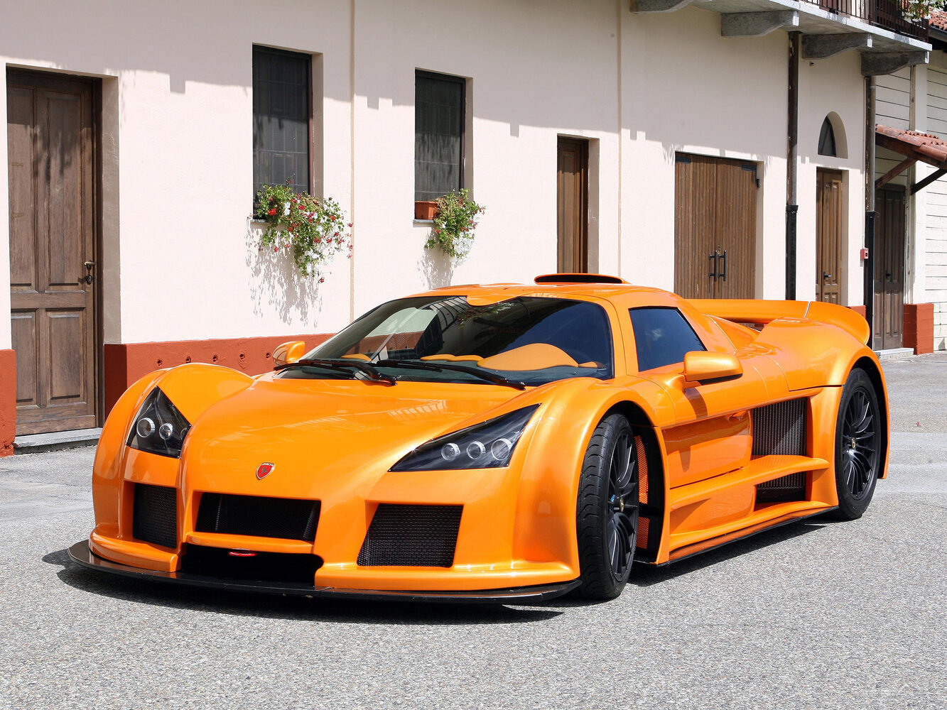 Gumpert Apollo (2005–2012) · 4.2 MT (650 л.с.)