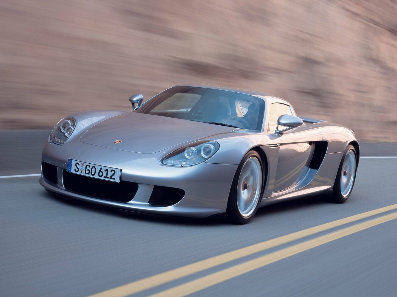 Porsche Carrera GT (2003–2007) · 5.7 MT (612 л.с.)