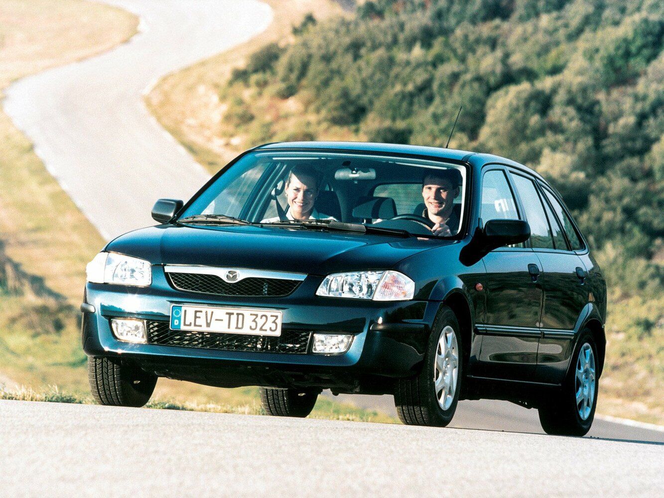 Mazda 323 VI (BJ) (1998–2001) · 2.0d MT (71 л.с.)
